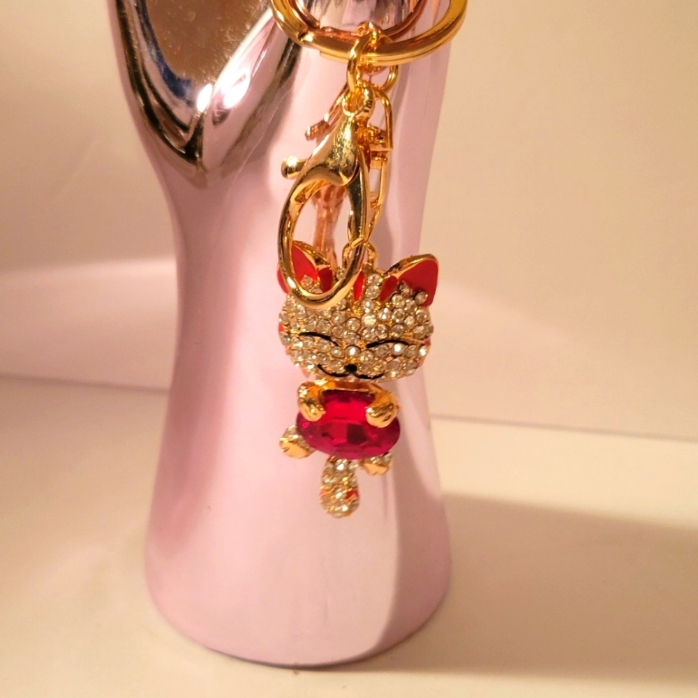 Sparkling Cat Keychain with Red Accents may also be used as a purse charm.